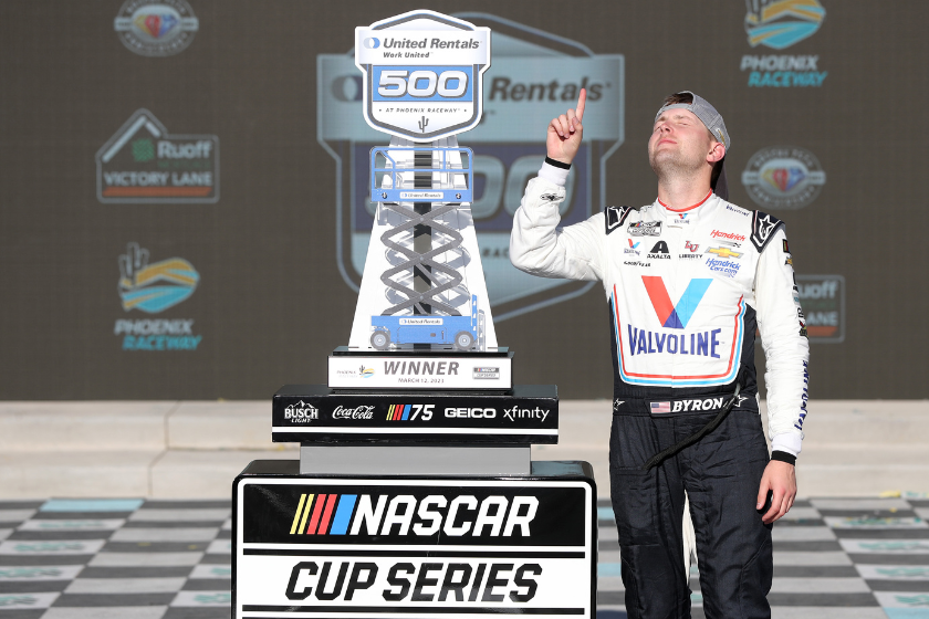 William Byron, driver of the #24 Valvoline Chevrolet, celebrates in victory lane after winning the NASCAR Cup Series United Rentals Work United 500 at Phoenix Raceway