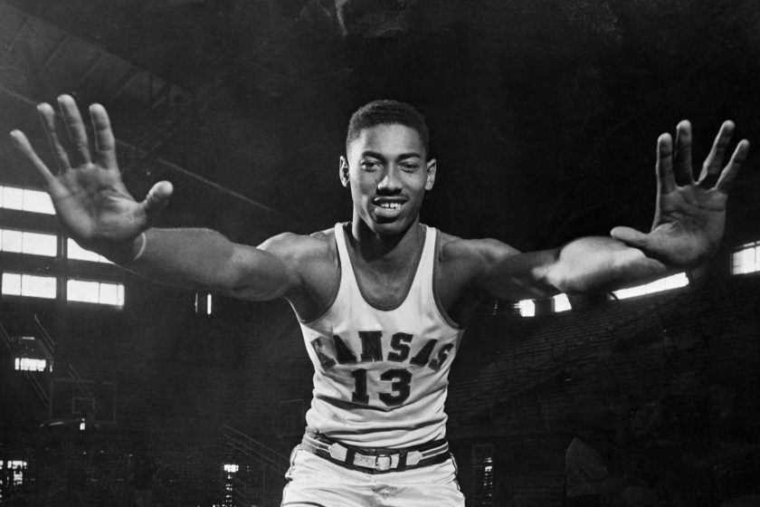 Wilt "The Stilt" Chamberlain, 7-foot Kansas Center, displays the mitts which have deflected 127 enemy shots during Kansas' first twenty games this season
