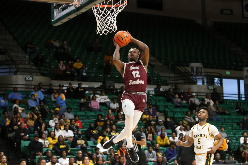 guard Zytarious Mortle (12) goes up for a dunk during the SWAC Basketball Championship game between the Texas Southern Tigers and the Grambling State Tigers 