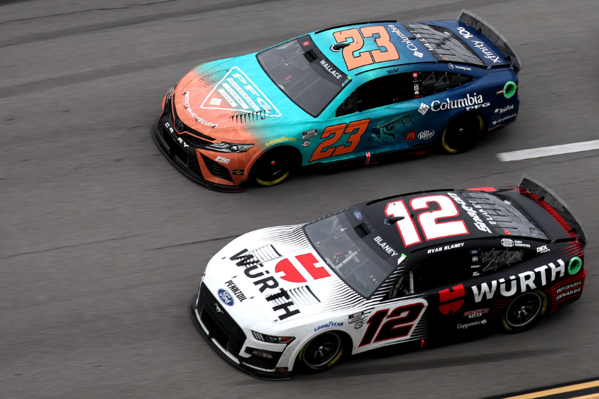 Ryan Blaney, driver of the #12 Wurth Ford, and Bubba Wallace, driver of the #23 Columbia Sportswear Company Toyota, race during the NASCAR Cup Series GEICO 500 at Talladega Superspeedway