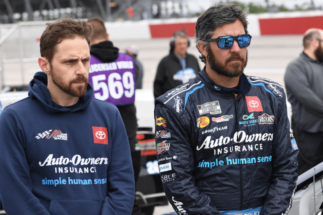 Crew chief James Small and Martin Truex Jr. look on before the running of the 2022 Goodyear 400 at Darlington Raceway