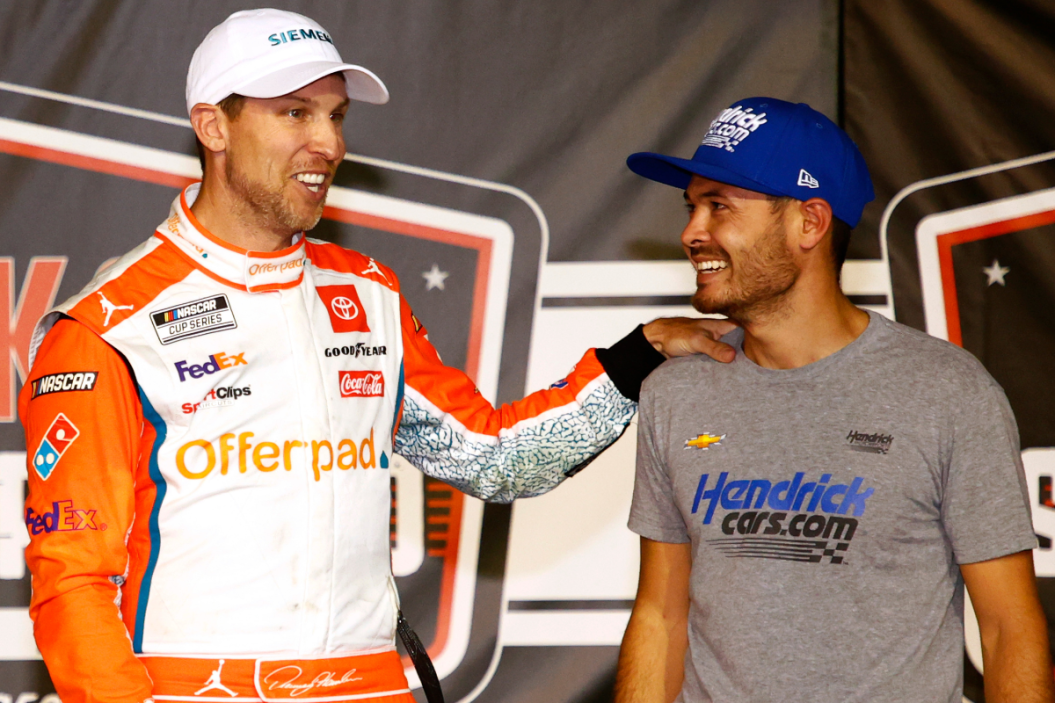 Denny Hamlin congratulates Kyle Larson in victory lane after Larson wins 2021 Cook Out Southern 500 at Darlington Raceway