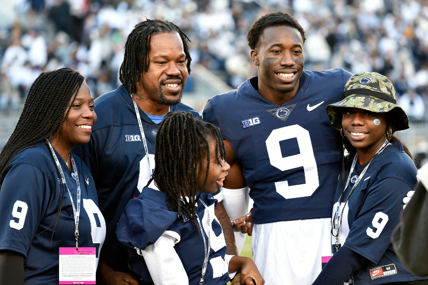 Penn State cornerback Joey Porter, Jr. (9) poses with his dad, former Pittsburgh Steelers linebacker Joey Porter, Sr., and his family during the senior day ceremonies before the Michigan State Spartans versus Penn State Nittany Lions game