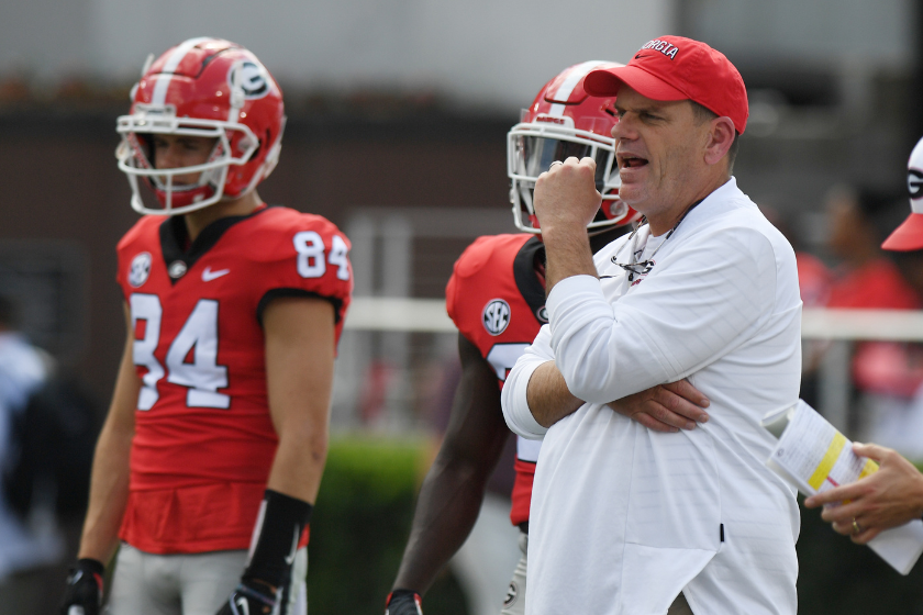 Georgia Bulldogs offensive coordinator Mike Bobo looks on during warmups before the Georgia G-Day Red and Black Spring Game