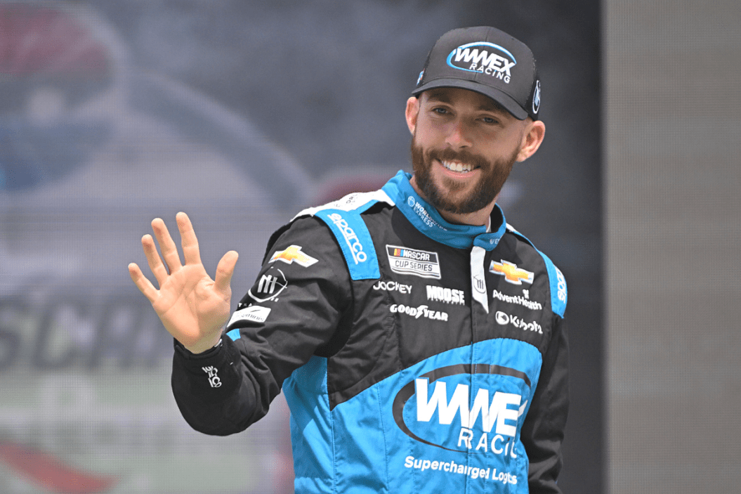 Ross Chastain waves to fans as he walks onstage during driver intros prior to the 2023 EchoPark Automotive Grand Prix at Circuit of The Americas