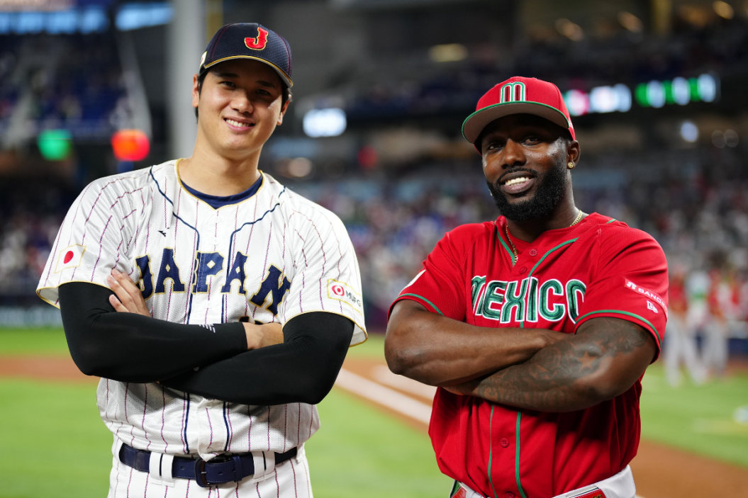 Shohei Ohtani #16 of Team Japan and Randy Arozarena #56 of Team Mexico pose for a photo on the field prior to the 2023 World Baseball Classic Semifinal game at loanDepot Park