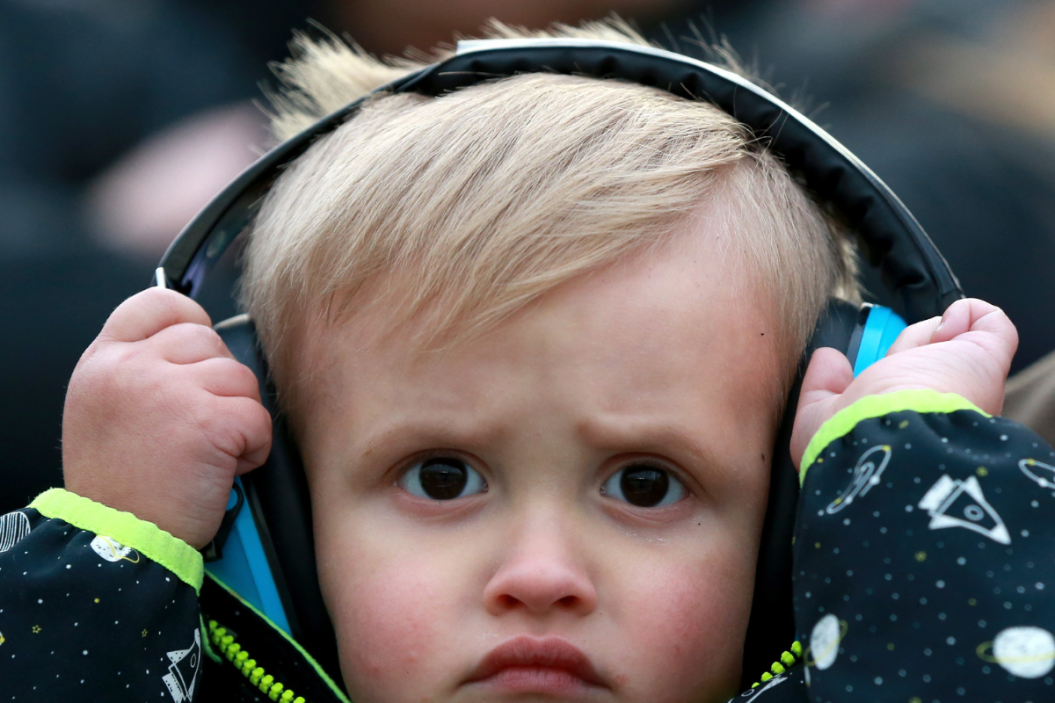 A young race fan looks on during the 2019 Digital Ally 400 at Kansas Speedway