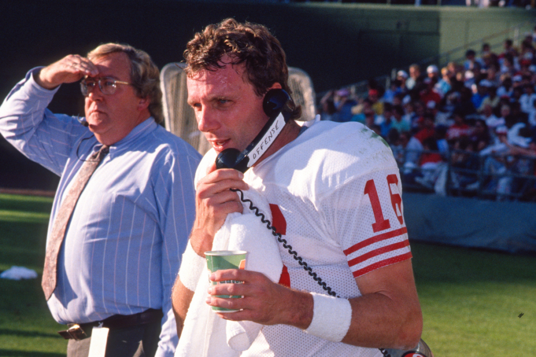 Joe Montana on the phone on the sidelines. San Francisco 49ers 48 vs San Diego Chargers 10 at Jack Murphy Stadium