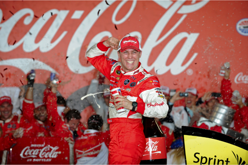 Kevin Harvick celebrates in Victory Lane after winning the 2013 Coca-Cola 600 at Charlotte Motor Speedway