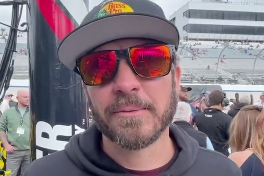 Martin Truex Jr. gets interviewed after brother Ryan won NASCAR Xfinity race at Dover Motor Speedway