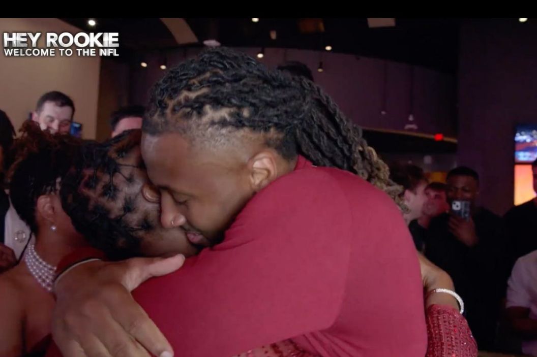 Quentin Johnston hugs his mom during draft night.