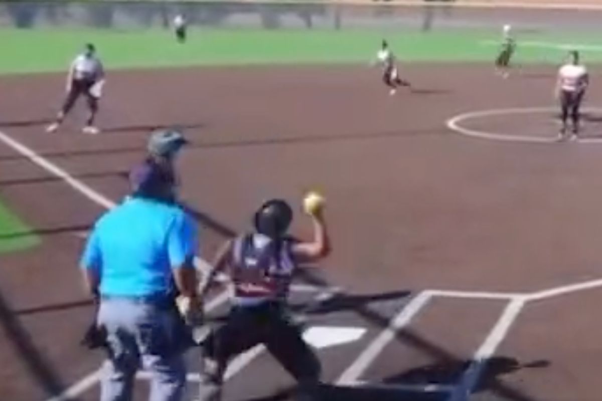 Texas softball catcher under investigation for intentionally throwing at batters.