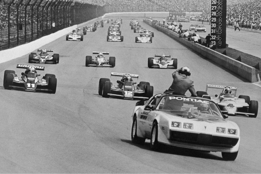 The pace car makes its final run coming into the first turn leading the front row to start the 64th running of the Indy 500