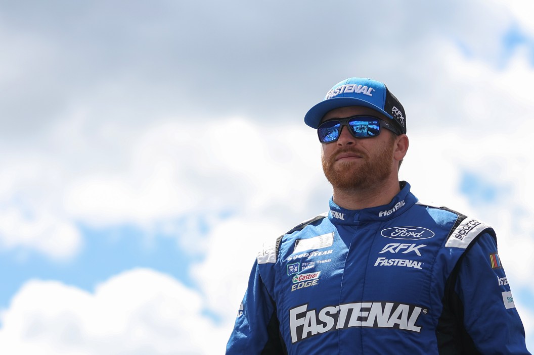 DOVER, DELAWARE - MAY 01: Chris Buescher, driver of the #17 Fastenal Ford, walks onstage during driver intros prior to the NASCAR Cup Series Würth 400 at Dover International Speedway on May 01, 2023 in Dover, Delaware.