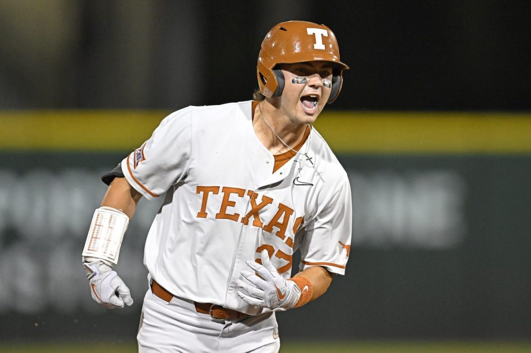 A Texas player screams as he rounds the bases.
