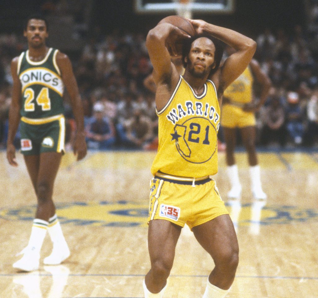 World B. Free shoots the ball for the Warriors.
