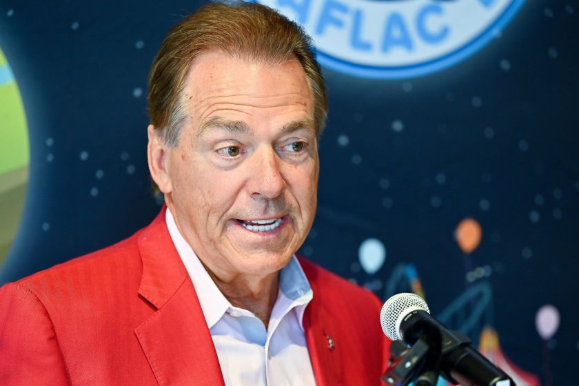 Nick Saban speaks at an event.