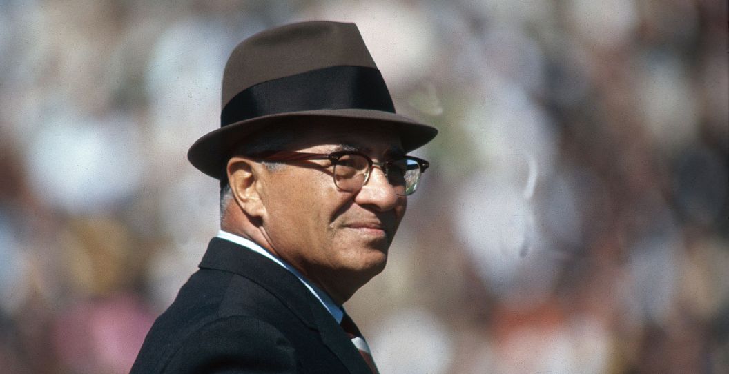 Vince Lombardi looks on during an NFL game.