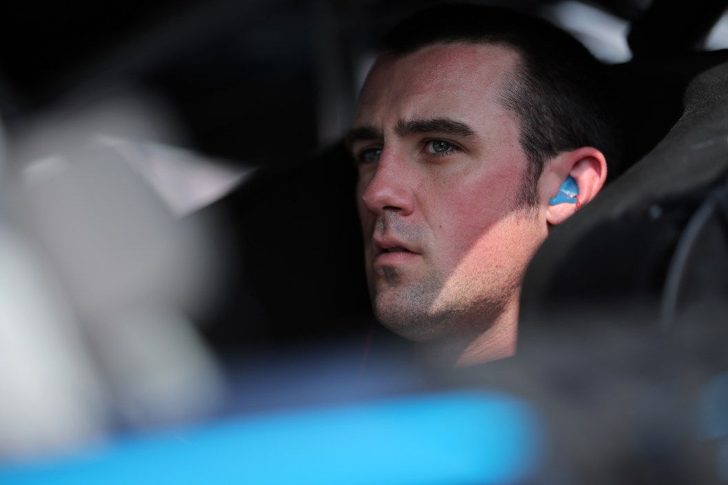 MADISON, ILLINOIS - JUNE 03: Austin Cindric, driver of the #2 Freightliner Ford, sits in his car during qualifying for the NASCAR Cup Series Enjoy Illinois 300 at WWT Raceway on June 03, 2023 in Madison, Illinois.