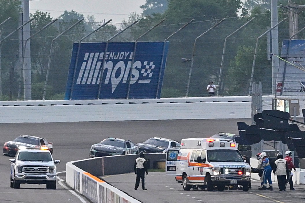 A pit crew member of the #43 Bommarito.com Chevrolet, is carried to an ambulance after an incident on pit road during the NASCAR Cup Series Enjoy Illinois 300 at WWT Raceway on June 04, 2023 in Madison, Illinois.