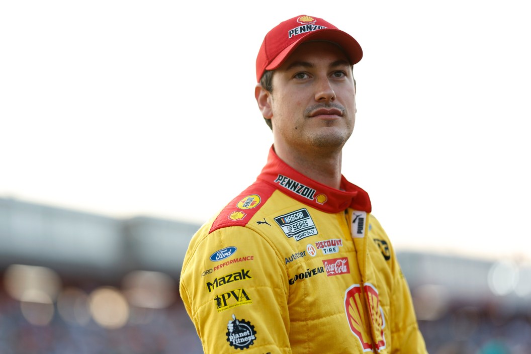 NORTH WILKESBORO, NORTH CAROLINA - MAY 21: Joey Logano, driver of the #22 Shell Pennzoil Ford, waits on the grid prior to the NASCAR Cup Series All-Star Race at North Wilkesboro Speedway on May 21, 2023 in North Wilkesboro, North Carolina.