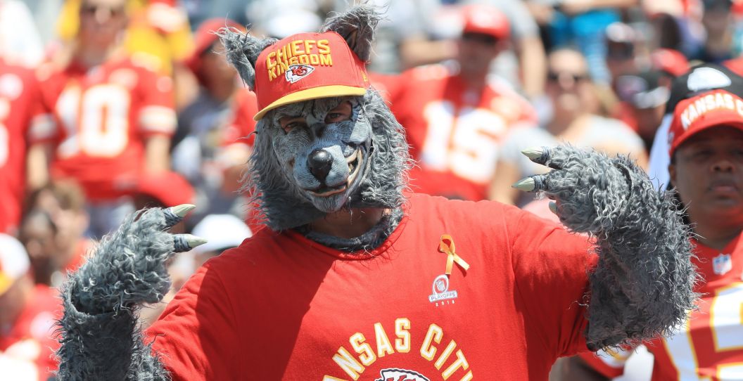 Xander Babudar, infamous Chiefs fan, poses for a picture with his fingers up.
