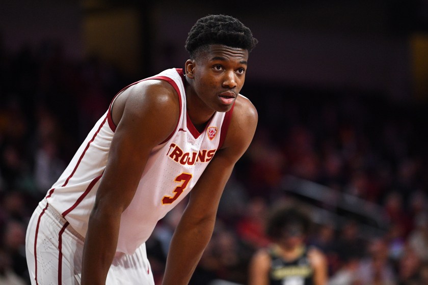 Vincent Iwuchukwu looks on during a USC basketball game.