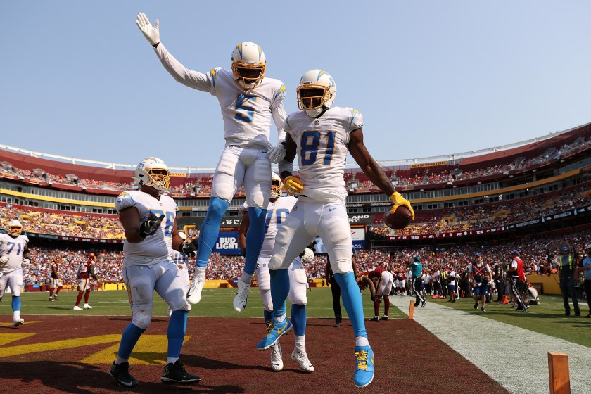 Mike Williams celebrates with teammates after scoring a touchdown.