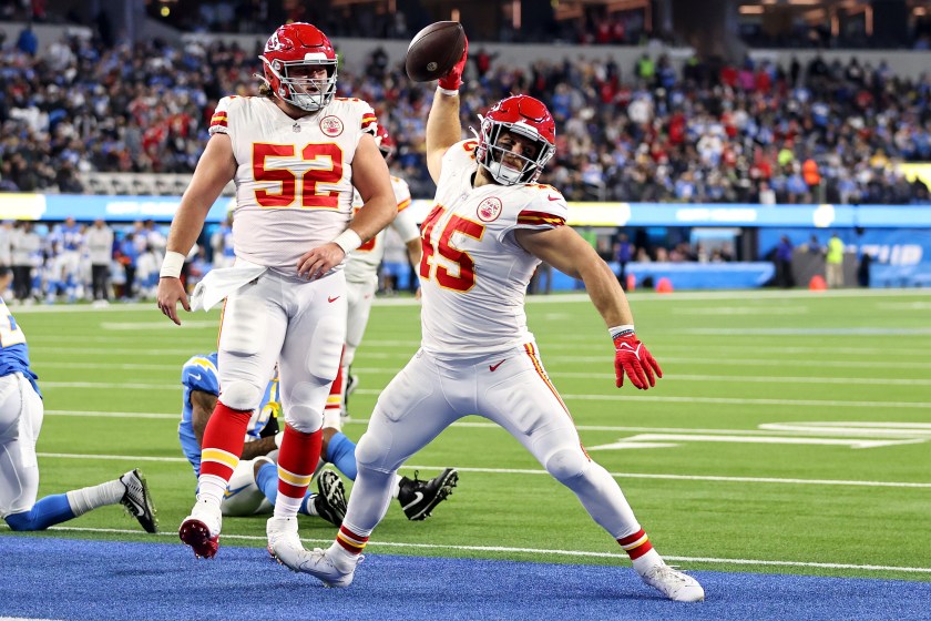 Fullback Mike Burton spikes the ball after a touchdown for the Chiefs.