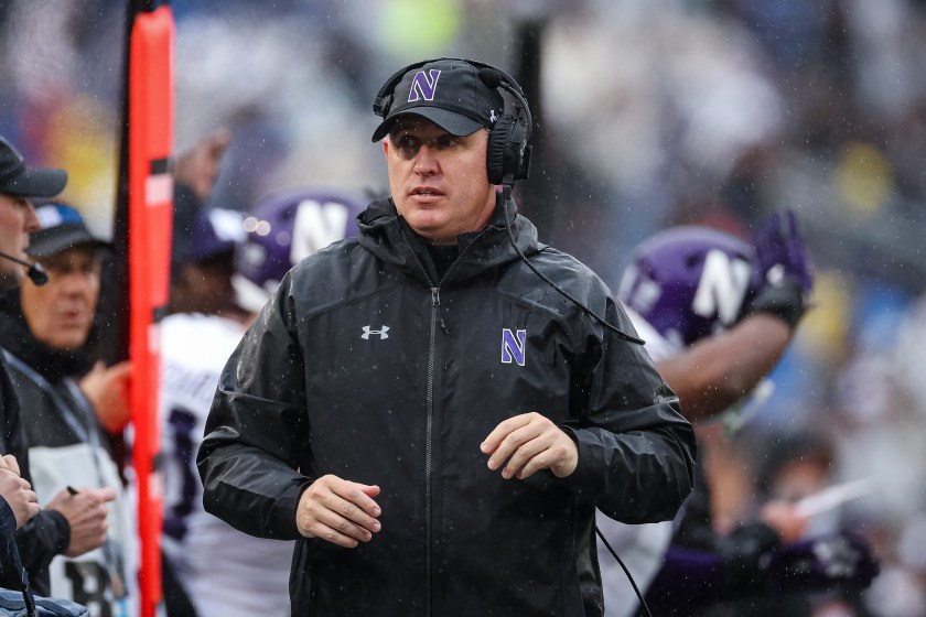 Northwestern head coach Pat Fitzgerald stands on the sideline. 