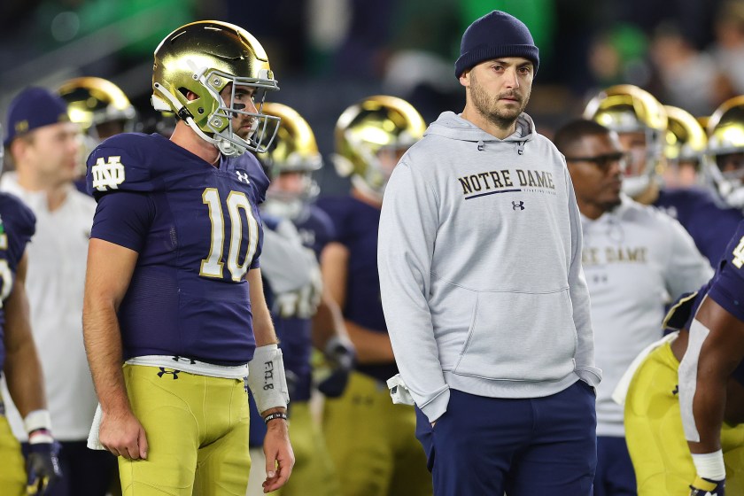 Tommy Rees stands on the sideline of a Notre Dame game.