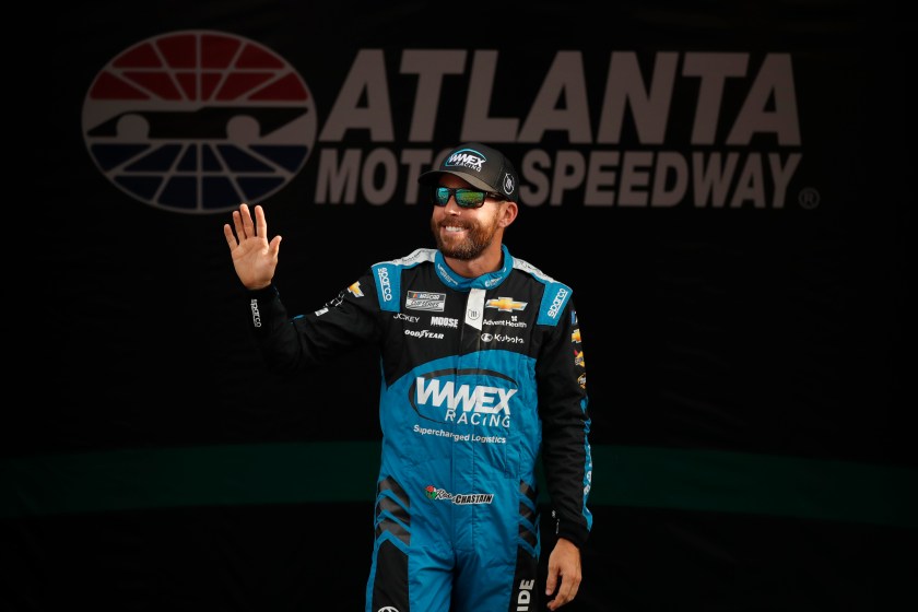 Ross Chastain waves to the fans at Atlanta Motor Speedway.