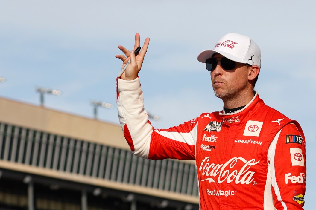 Denny Hamlin waves to the fans.