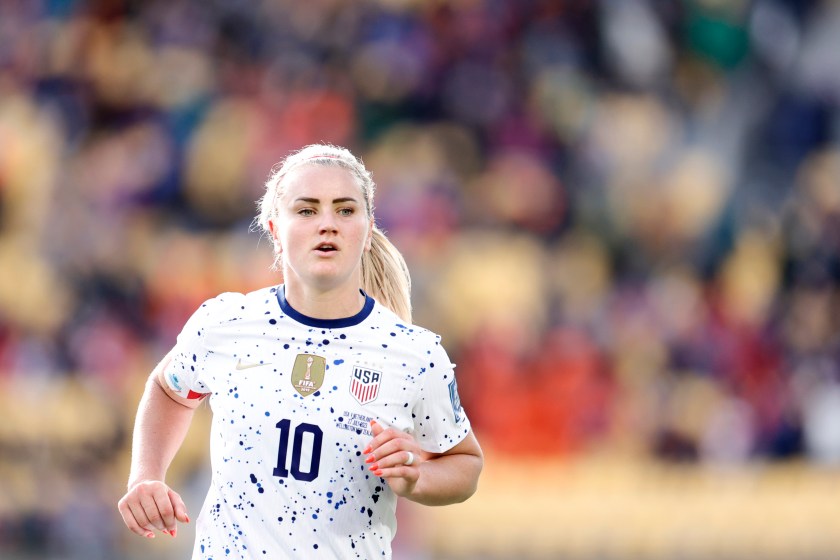 Lindsey Horan runs during a match in the world cup.