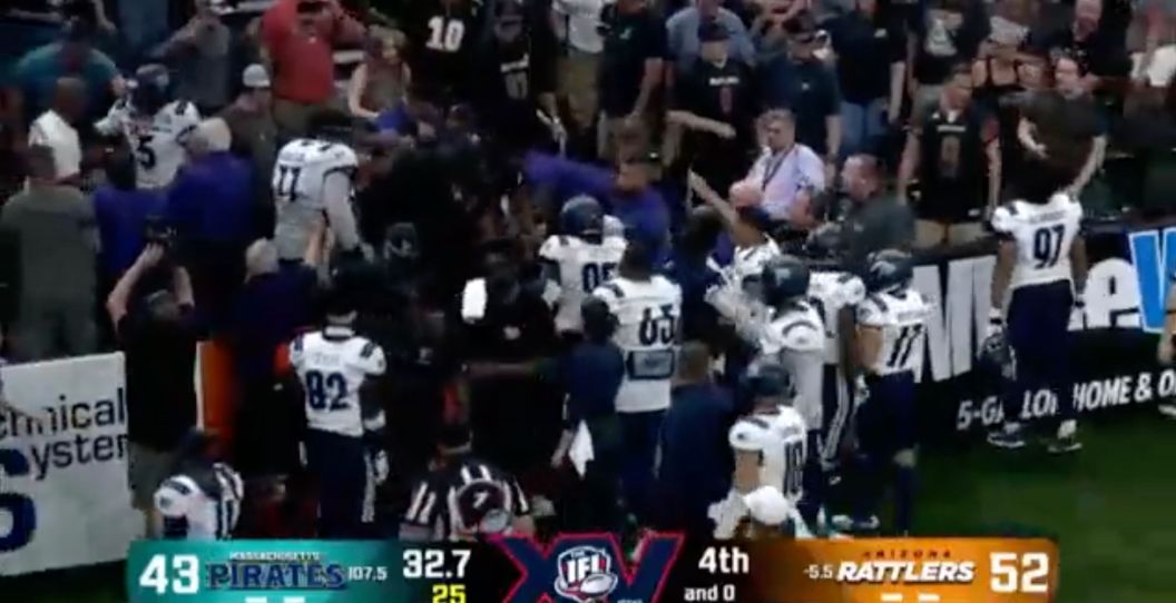 A brawl breaks out between Indoor Football League players and fans.