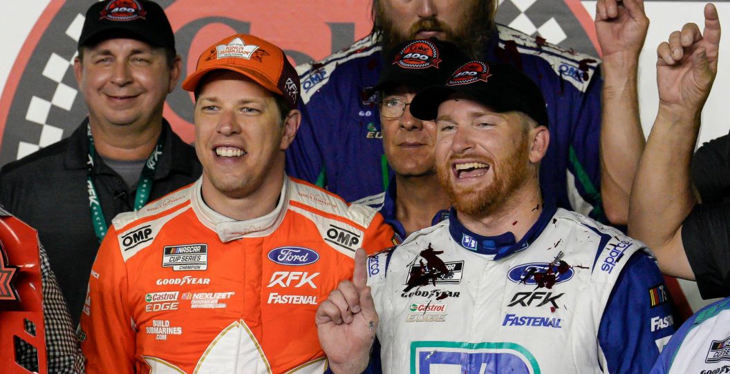 Brad Keselowski smiles with his teammate.