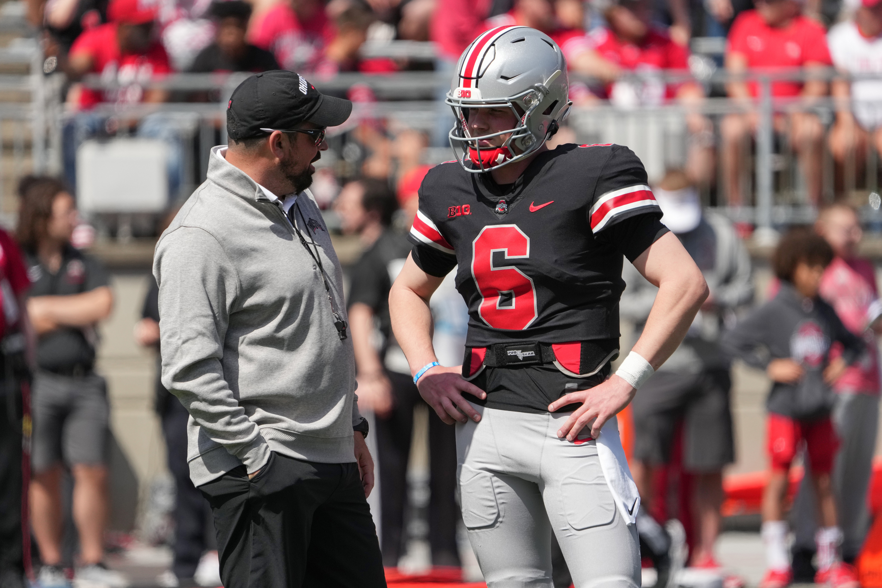 COLUMBUS, OH - APRIL 15: Ohio State Buckeyes head coach Ryan Day talks with Kyle McCord #6 of the Ohio State Buckeyes during the LiFEsports Spring Game, presented by Union Home Mortgage at Ohio Stadium in Columbus, Ohio on April 15, 2023. 