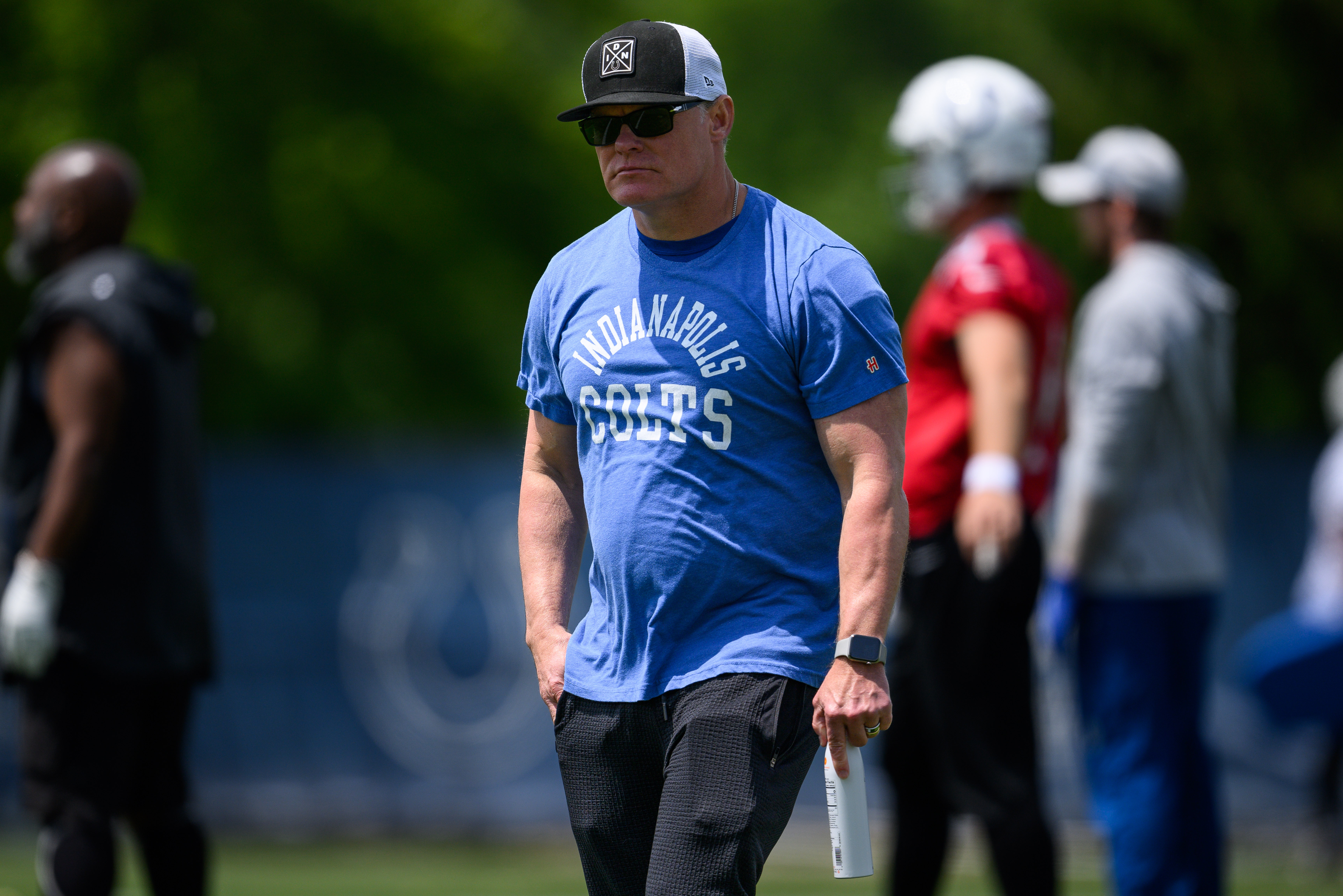 INDIANAPOLIS, IN - MAY 25: Indianapolis Colts general manager Chris Ballard watches a drill during the Indianapolis Colts OTA on May 25, 2023 at the Indiana Farm Bureau Football Center in Indianapolis, IN. 