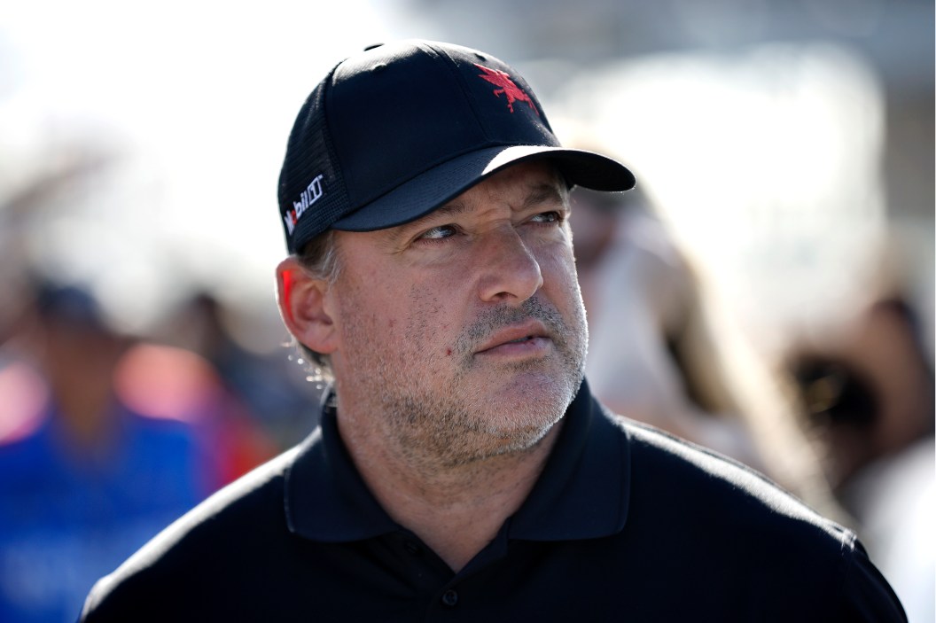 HOMESTEAD, FLORIDA - OCTOBER 22: NASCAR Hall of Famer Tony Stewart looks on from the grid prior to the NASCAR Xfinity Series Contender Boats 300 at Homestead-Miami Speedway on October 22, 2022 in Homestead, Florida.