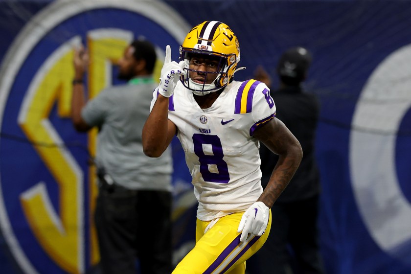 ATLANTA, GEORGIA - DECEMBER 03: Malik Nabers #8 of the LSU Tigers celebrates after scoring a 34 yard touchdown against the Georgia Bulldogs during the third quarter in the SEC Championship game at Mercedes-Benz Stadium on December 03, 2022 in Atlanta, Georgia. 