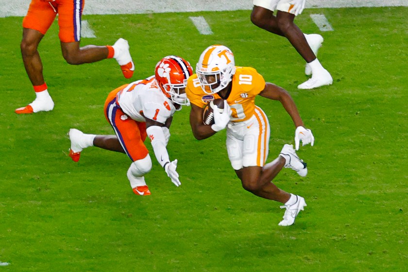 Squirrel White carries the ball for Tennessee.