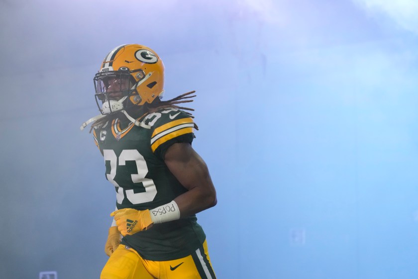 Green Bay Packers running back Aaron Jones runs out of the tunnel.