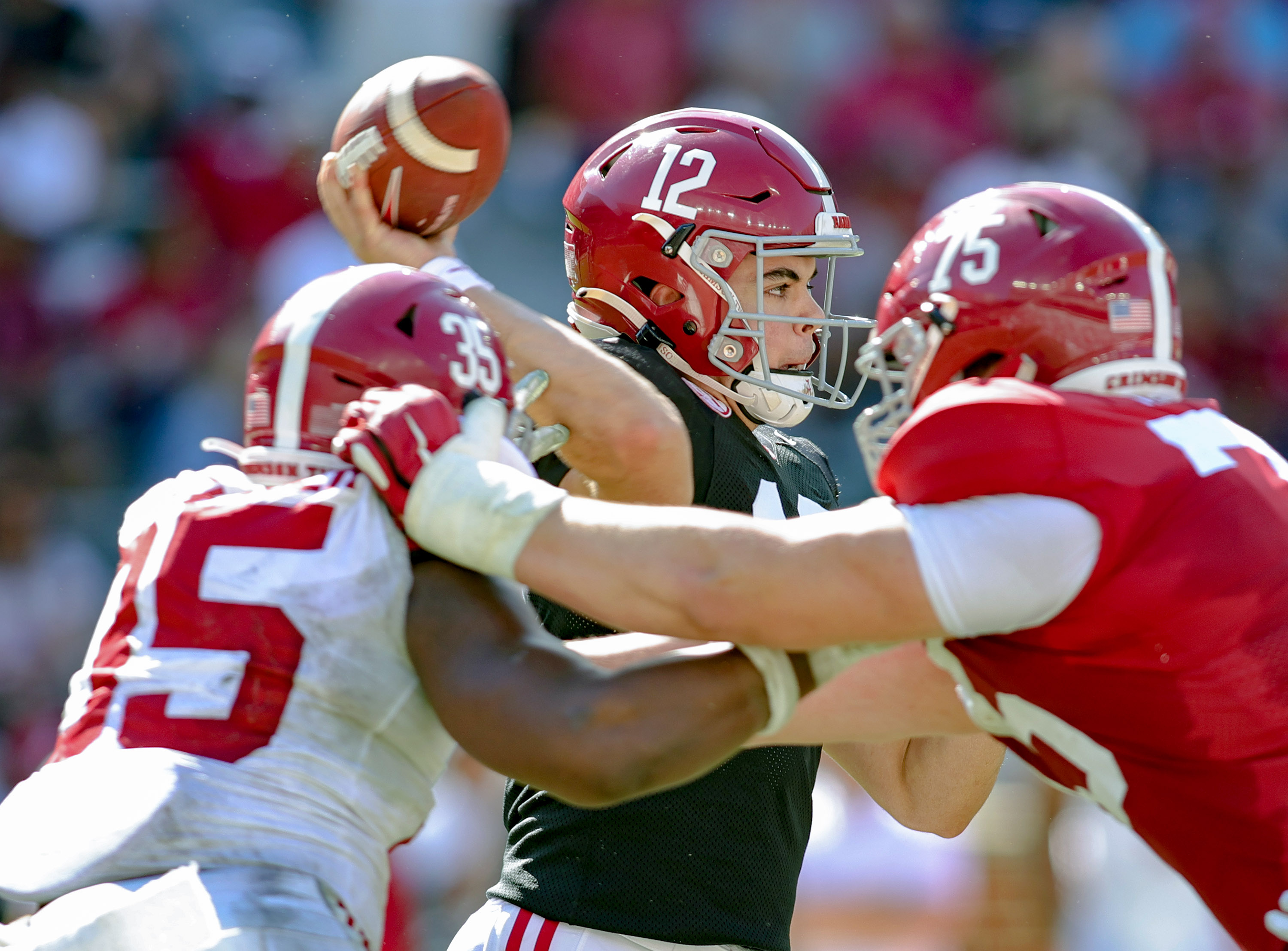 TUSCALOOSA, ALABAMA - APRIL 22: Dylan Lonergan #12 of the Crimson Team throws the ball during the second half of the Alabama Spring Football Game at Bryant-Denny Stadium on April 22, 2023 in Tuscaloosa, Alabama. 
