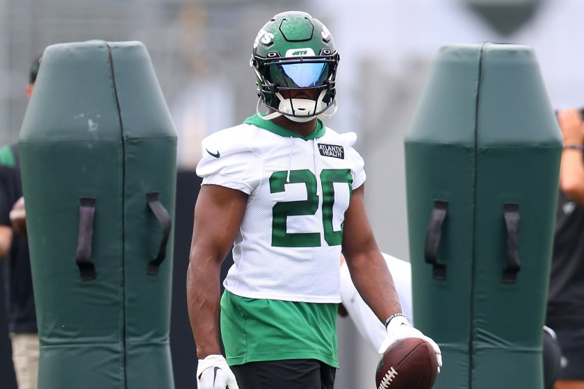 Jets running back Breece Hall in pads during practice.