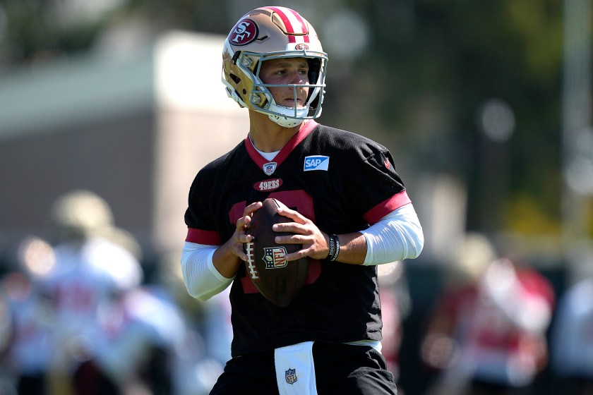 49ers quarterback Brock Purdy throws during training camp.
