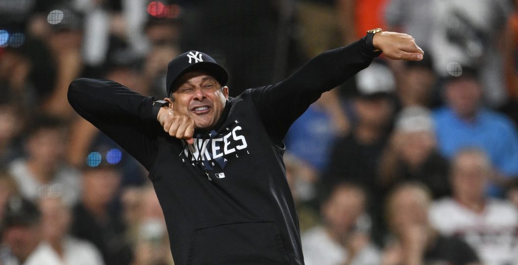 New York Yankees manager Aaron Boone mocks umpire before getting ejected.
