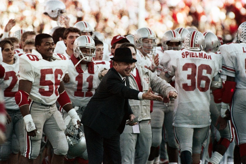 Earle Bruce greets his players in 1987.