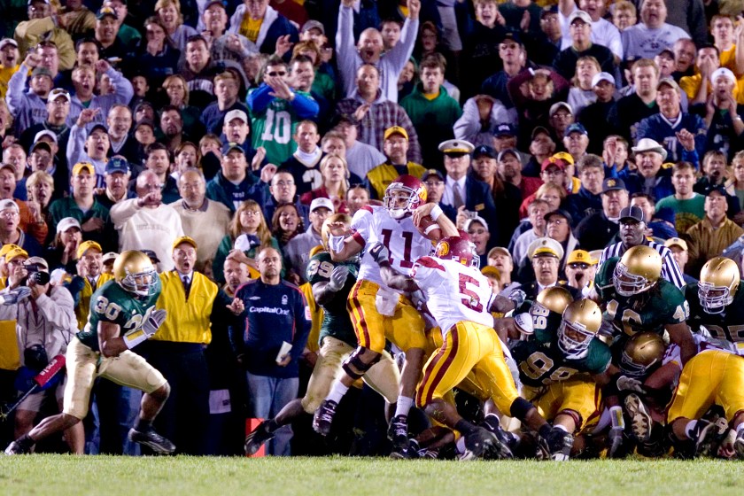 15 Oct 2005: USC quarterback Matt Leinart (11) is pushed in to the endzone by teammate Reggie Bush (5) for a touchdown in the closing moments of the USC Trojans 34-31 victory over the Notre Dame Fighting Irish at Notre Dame Stadium in South Bend, Indiana. 