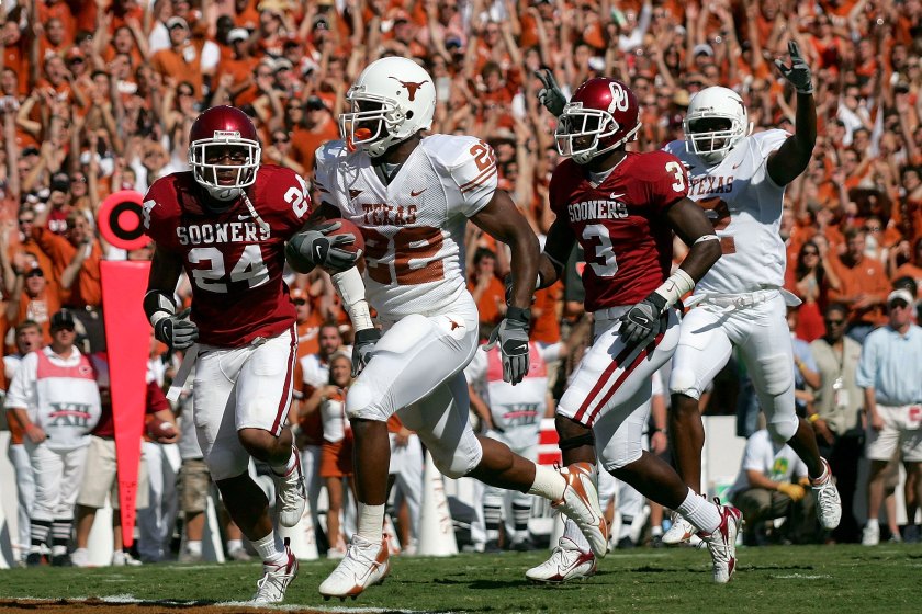 DALLAS - OCTOBER 7: Running back Selvin Young #22 of the Texas Longhorns runs for a touchdown against the Oklahoma Sooners during the Red River Shootout at the Cotton Bowl on October 7, 2006 in Dallas, Texas. 