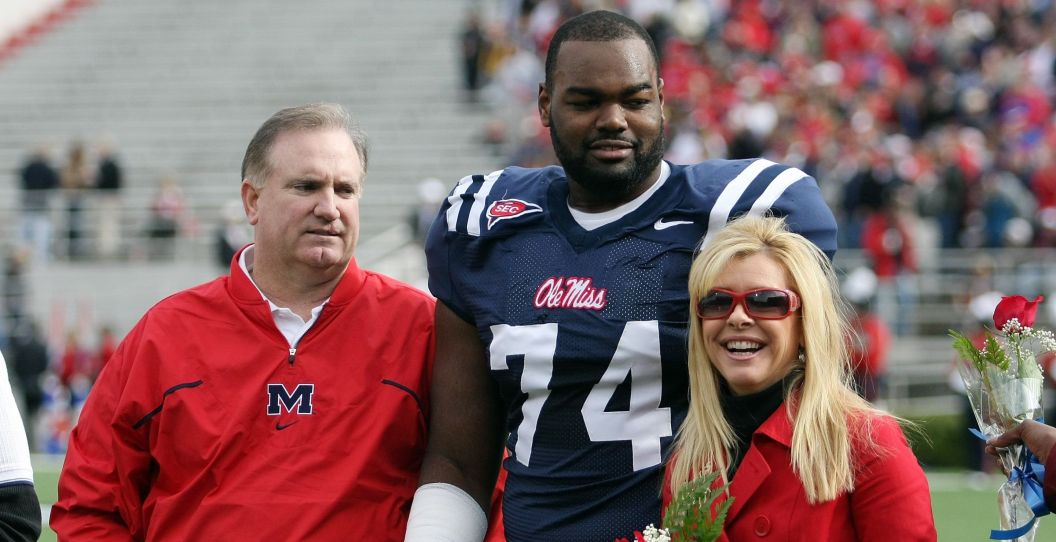 Michael Oher and the Tuohys at an Ole Miss game.